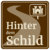 Hinter dem Schild